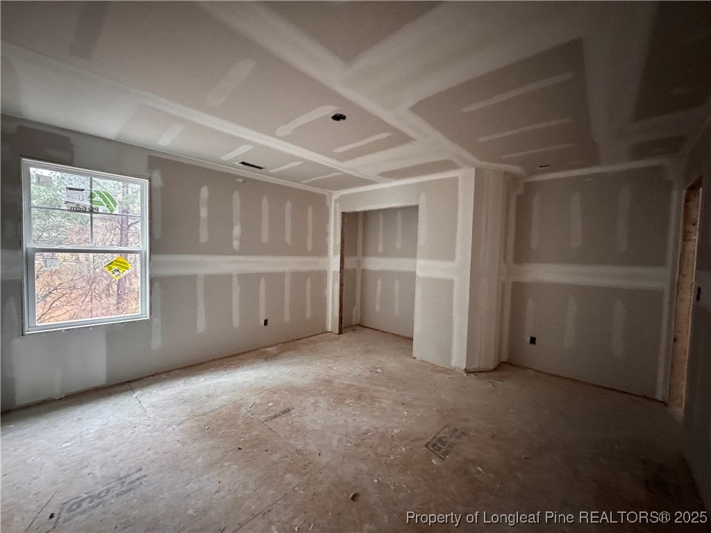 428 Redwater Trail Aberdeen, NC 28315 - Photo 32 of 48 an empty room with windows