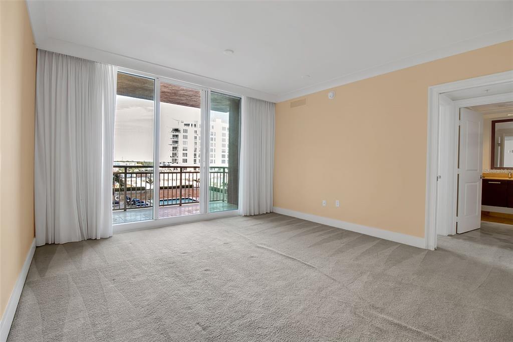 1350 Main Street, Unit 707 Sarasota, FL 34236 - Photo 20 of 68 an empty room with large windows