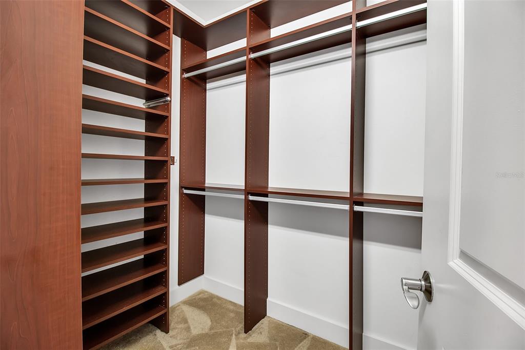 1350 Main Street, Unit 707 Sarasota, FL 34236 - Photo 39 of 68 a view of walk in closet with empty racks