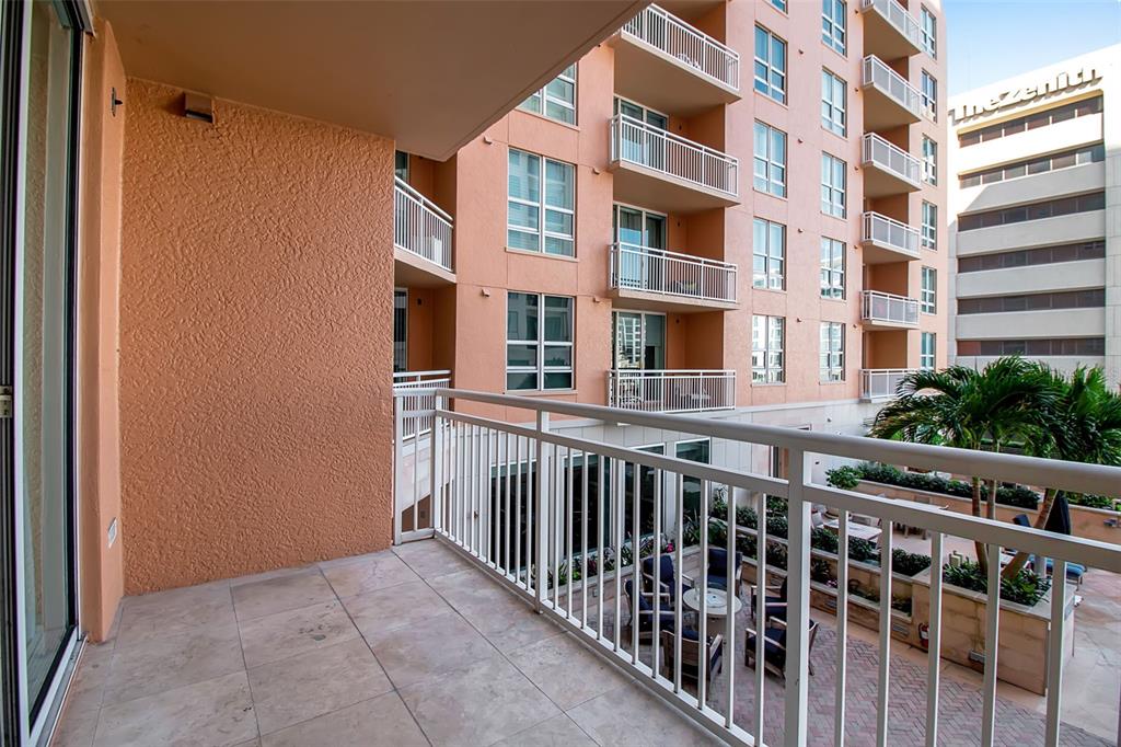 1350 Main Street, Unit 707 Sarasota, FL 34236 - Photo 43 of 68 a view of a building from a balcony