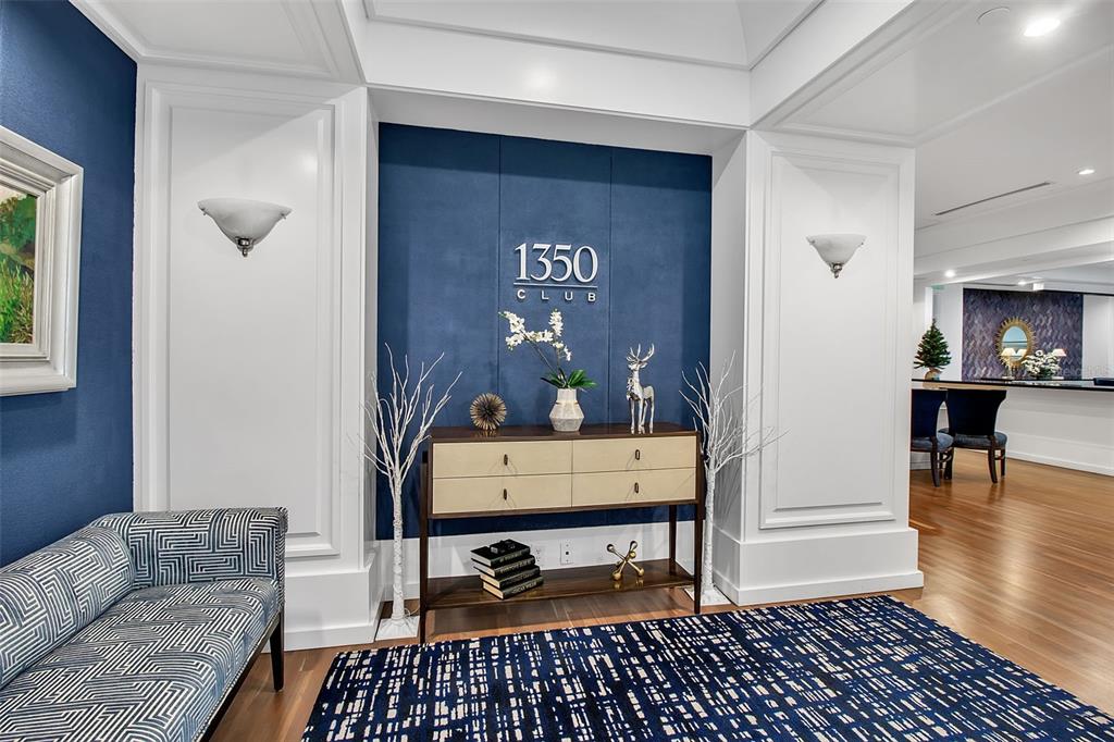 1350 Main Street, Unit 707 Sarasota, FL 34236 - Photo 50 of 68 a living room with furniture and wooden floor