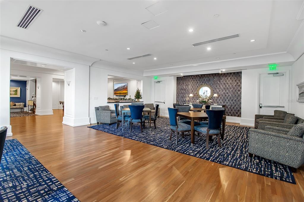 1350 Main Street, Unit 707 Sarasota, FL 34236 - Photo 57 of 68 a living room with fireplace furniture and wooden floor