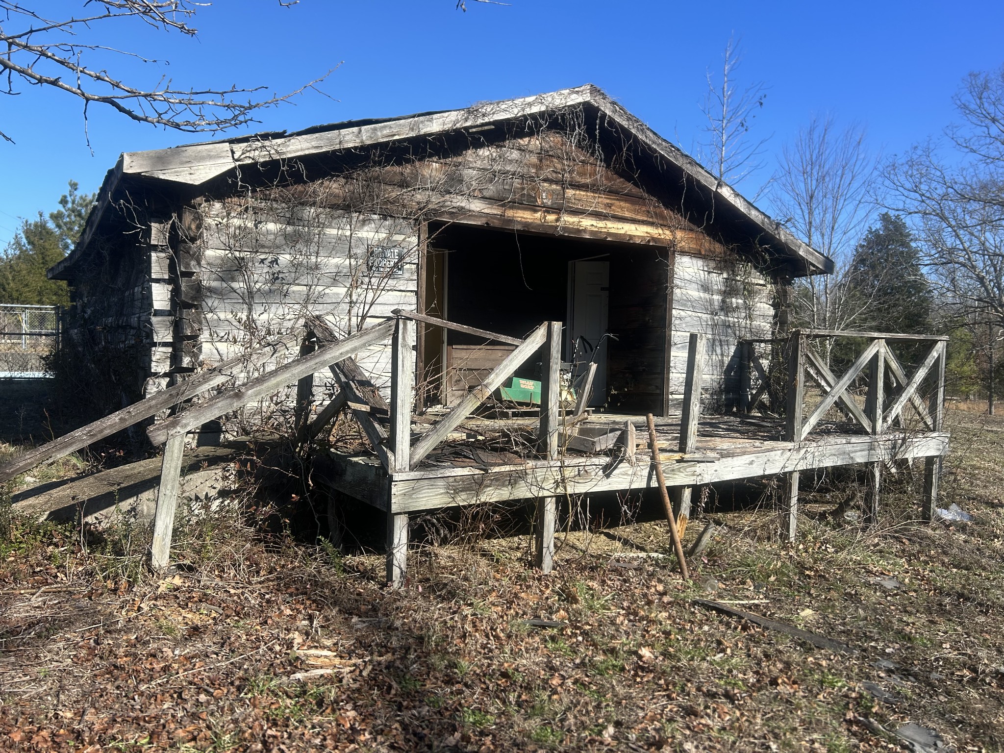 0 Deerwood Run Big Sandy, TN 38221 - Photo 5 of 7 a view of house with a yard and staircase