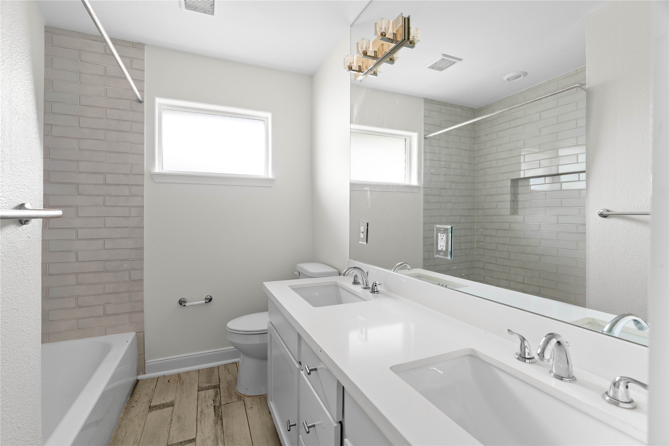 5515 Warm Springs Road Houston, TX 77035 - Photo 15 of 19 a bathroom with a sink a toilet and shower