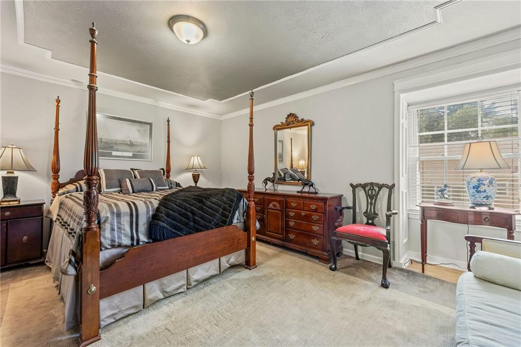 3825 Lavista Road, Unit Y3 Tucker, GA 30084 - Photo 12 of 24 a bedroom with furniture and a window
