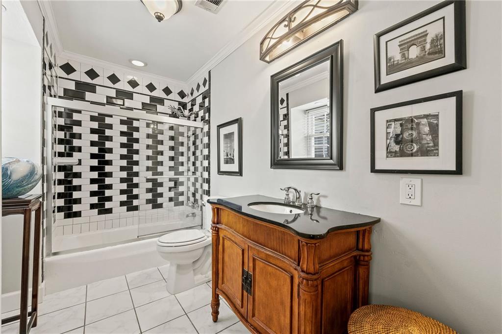 3825 Lavista Road, Unit Y3 Tucker, GA 30084 - Photo 13 of 24 a bathroom with a sink a toilet and shower