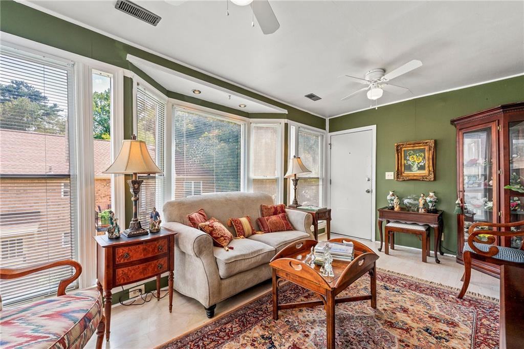 3825 Lavista Road, Unit Y3 Tucker, GA 30084 - Photo 9 of 24 a living room with furniture and a window