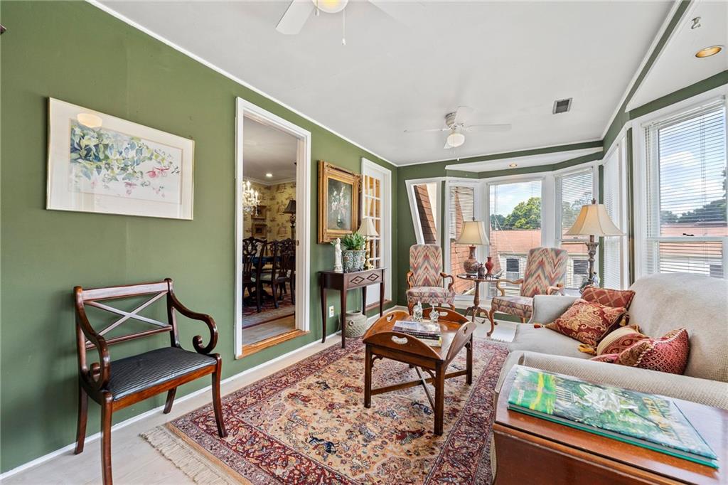 3825 Lavista Road, Unit Y3 Tucker, GA 30084 - Photo 10 of 24 a living room with furniture and a gate