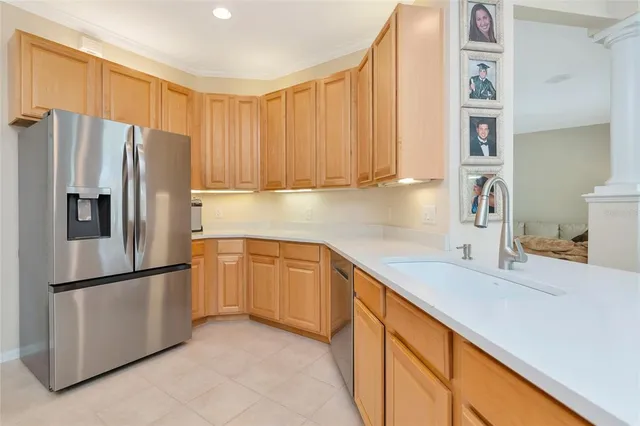 a bathroom with a sink a toilet a mirror and shower