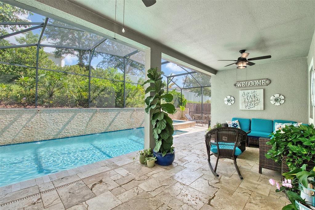 1111 Spruce Ridge Court Minneola, FL 34715 - Photo 24 of 34 a view of a porch with furniture and a yard