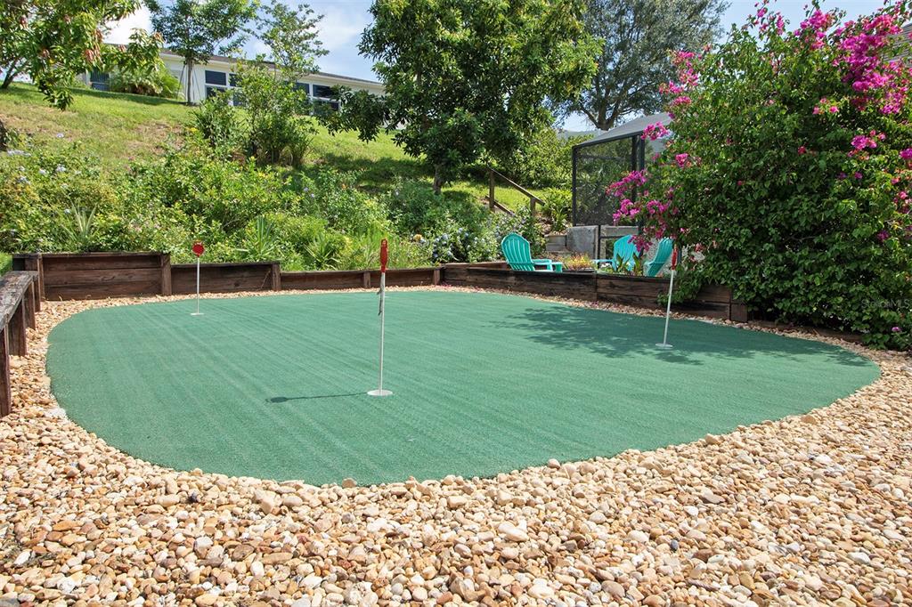 1111 Spruce Ridge Court Minneola, FL 34715 - Photo 29 of 34 a view of a golf ground with large trees