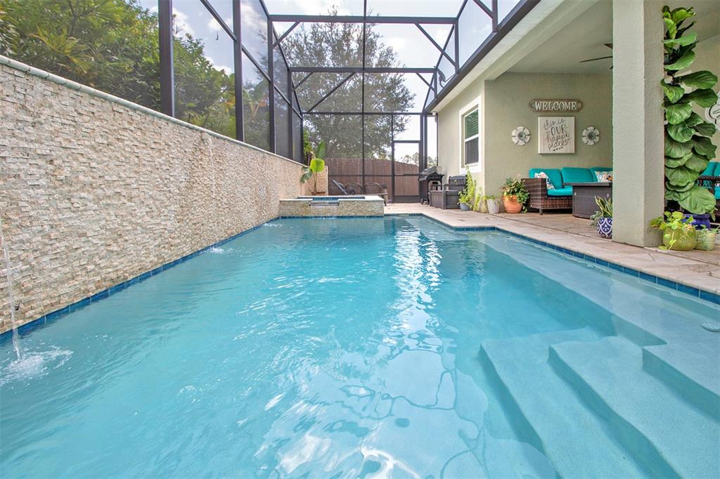 1111 Spruce Ridge Court Minneola, FL 34715 - Photo 4 of 34 a view of swimming pool with outdoor seating