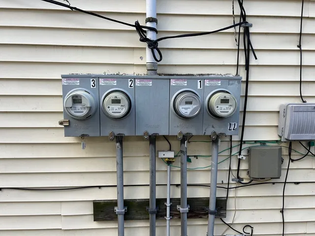 a view of storage and utility room with racks on wall