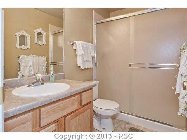 12009 Rio Secco Road Peyton, CO 80831 - Photo 20 of 24 Bath off downstairs second master bedroom