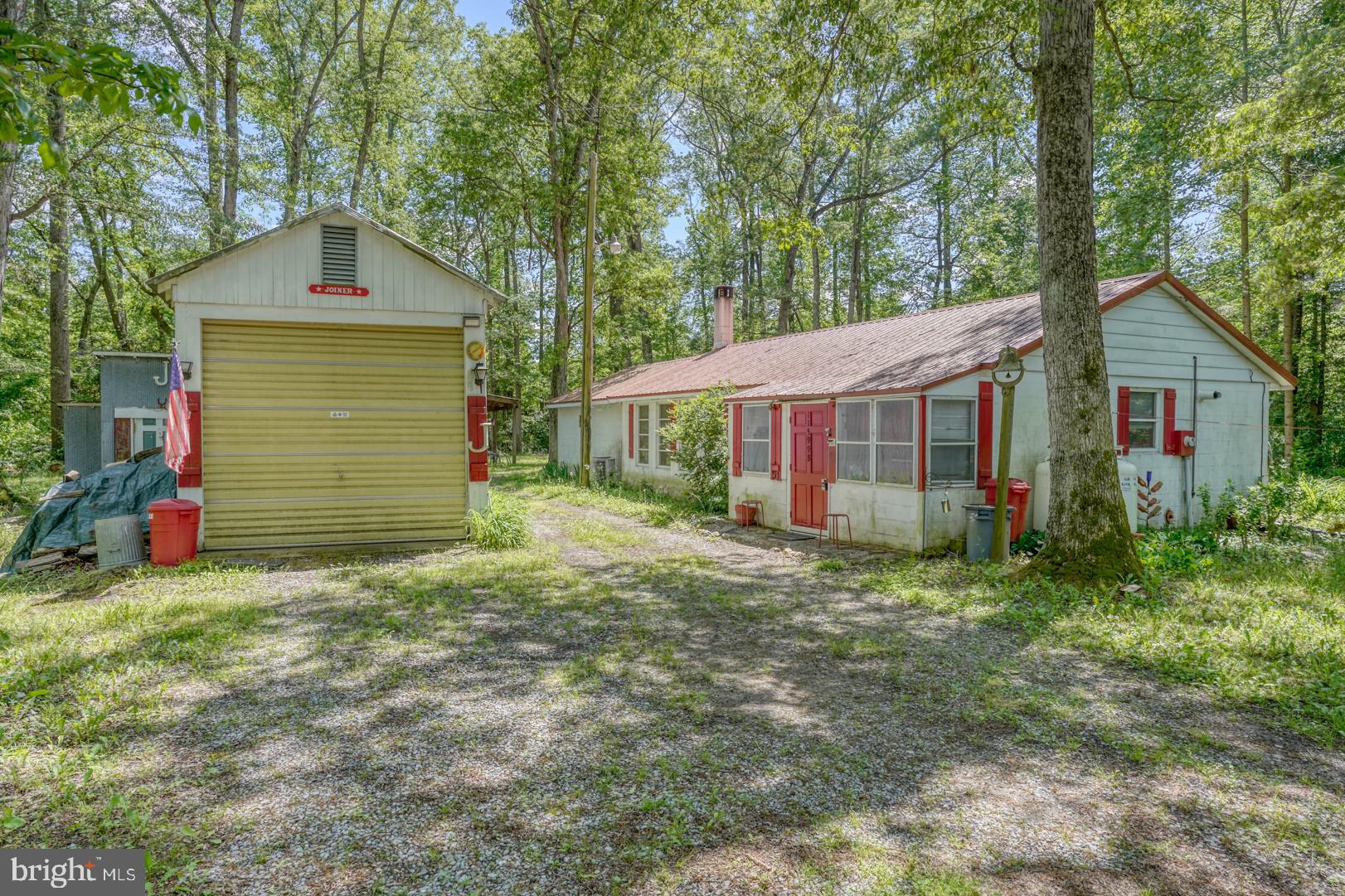 11599 Kibler Road Greensboro, MD 21639 - Photo 20 of 47 OVERSIZED GARAGE WITH AUTOMATIC OPENER