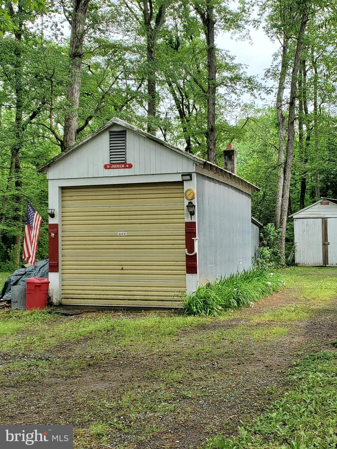 11599 Kibler Road Greensboro, MD 21639 - Photo 21 of 47 OVERSIZED GARAGE WITH TALL DOOR