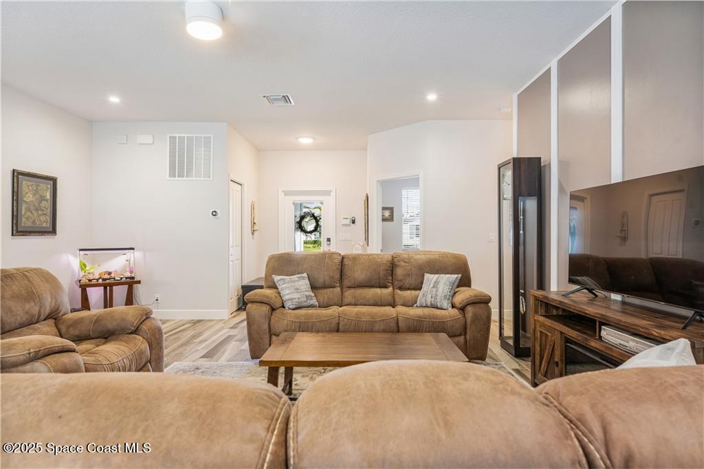Undisclosed Address Vero Beach, FL 32966 - Photo 13 of 36 a living room with furniture and a couch