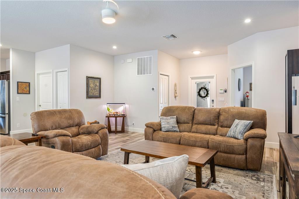 Undisclosed Address Vero Beach, FL 32966 - Photo 14 of 36 a living room with furniture and a couch