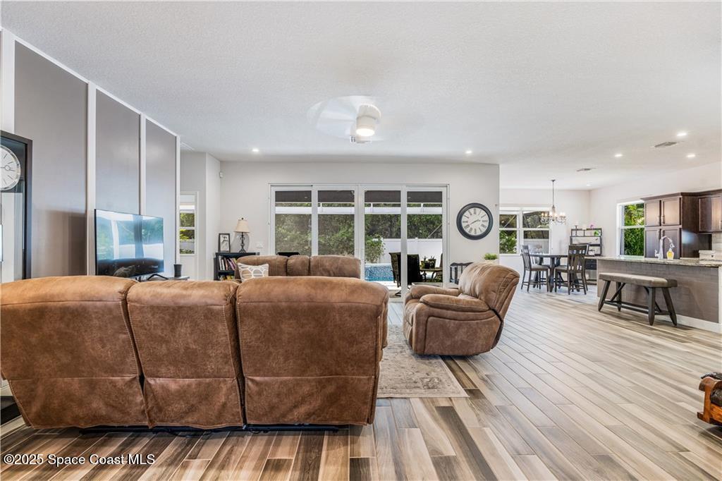Undisclosed Address Vero Beach, FL 32966 - Photo 15 of 36 a living room with furniture and a large window