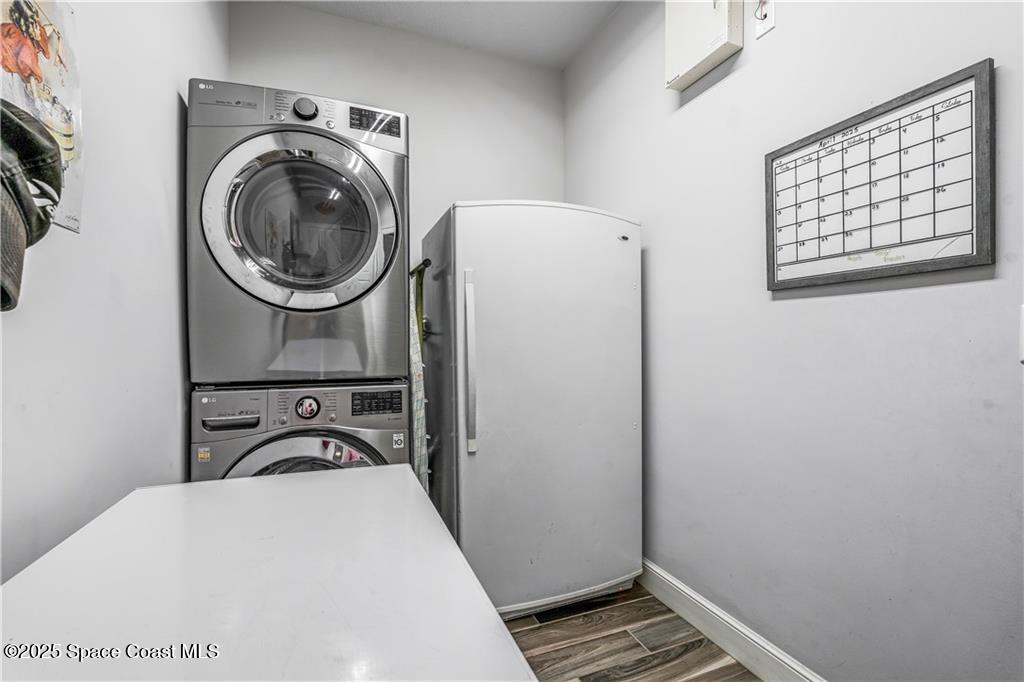 Undisclosed Address Vero Beach, FL 32966 - Photo 34 of 36 a close view of a utility room with dryer and washer