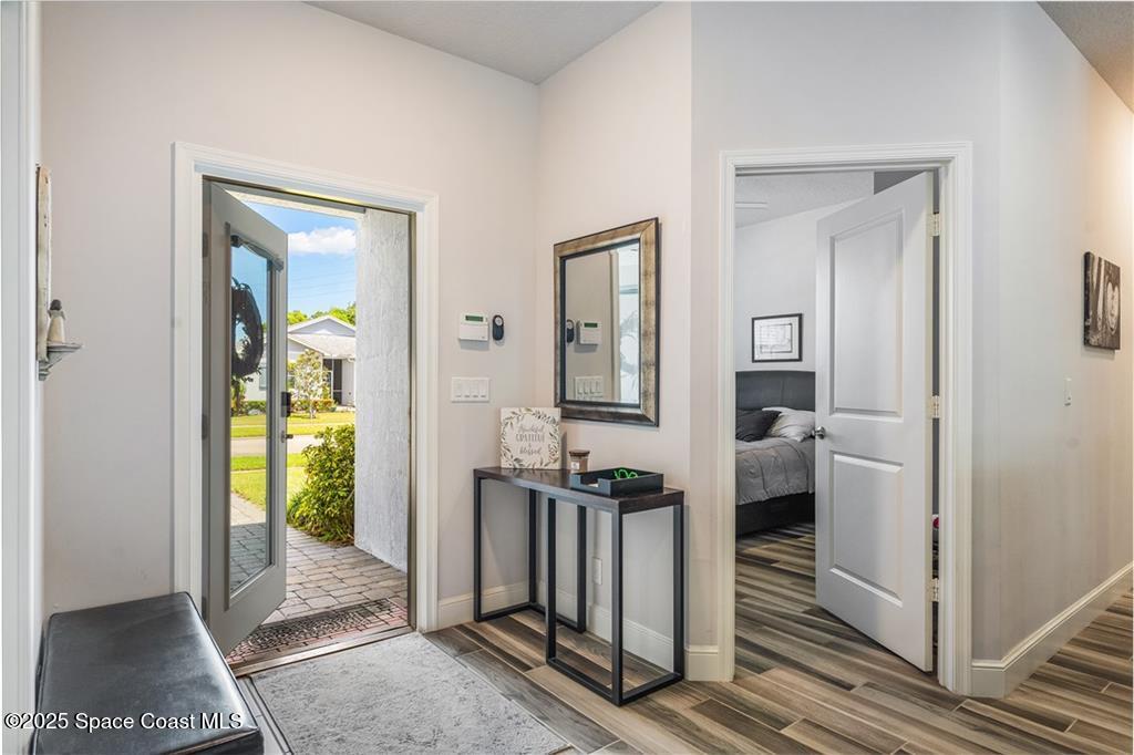Undisclosed Address Vero Beach, FL 32966 - Photo 35 of 36 a view of a hallway with living room