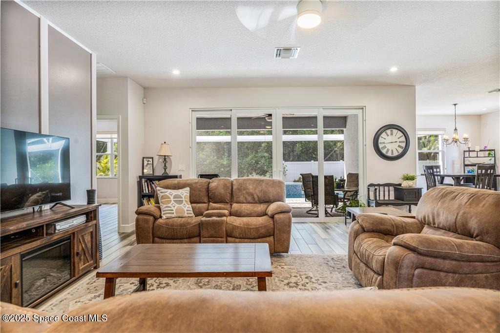 Undisclosed Address Vero Beach, FL 32966 - Photo 8 of 36 a living room with furniture and a large window