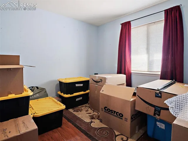 a room with furniture and a window