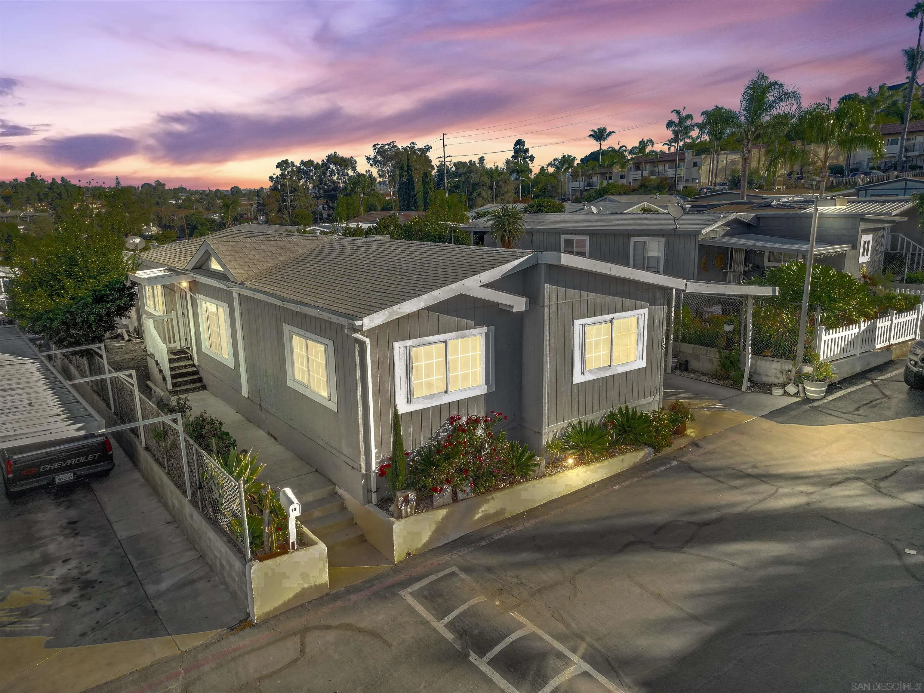 a aerial view of a house with a yard
