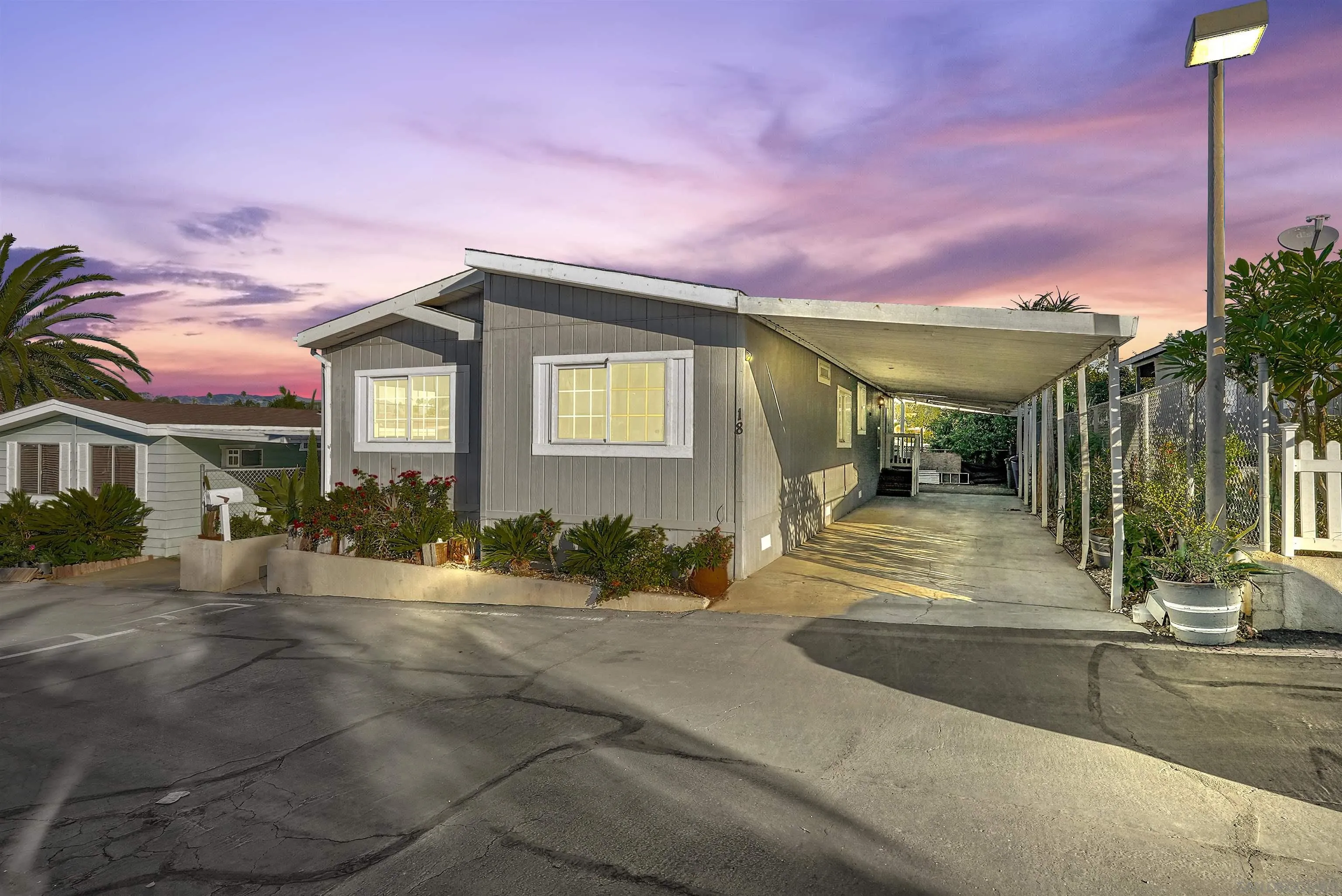 1455 Alturas Road, Unit SPC 18 Fallbrook, CA 92028 - Photo 2 of 50 a front view of a house with a yard