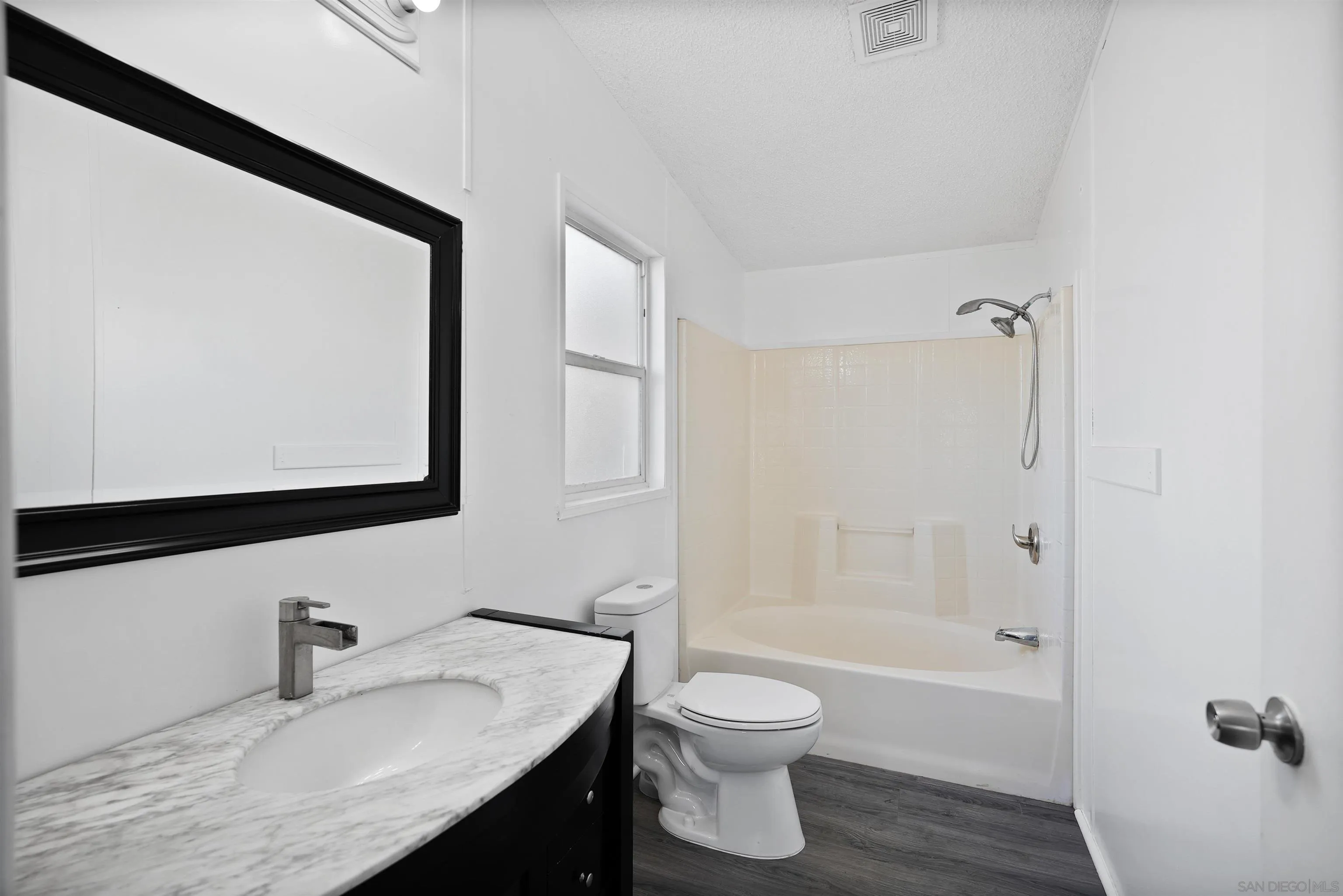 1455 Alturas Road, Unit SPC 18 Fallbrook, CA 92028 - Photo 24 of 50 a bathroom with a granite countertop sink toilet and shower