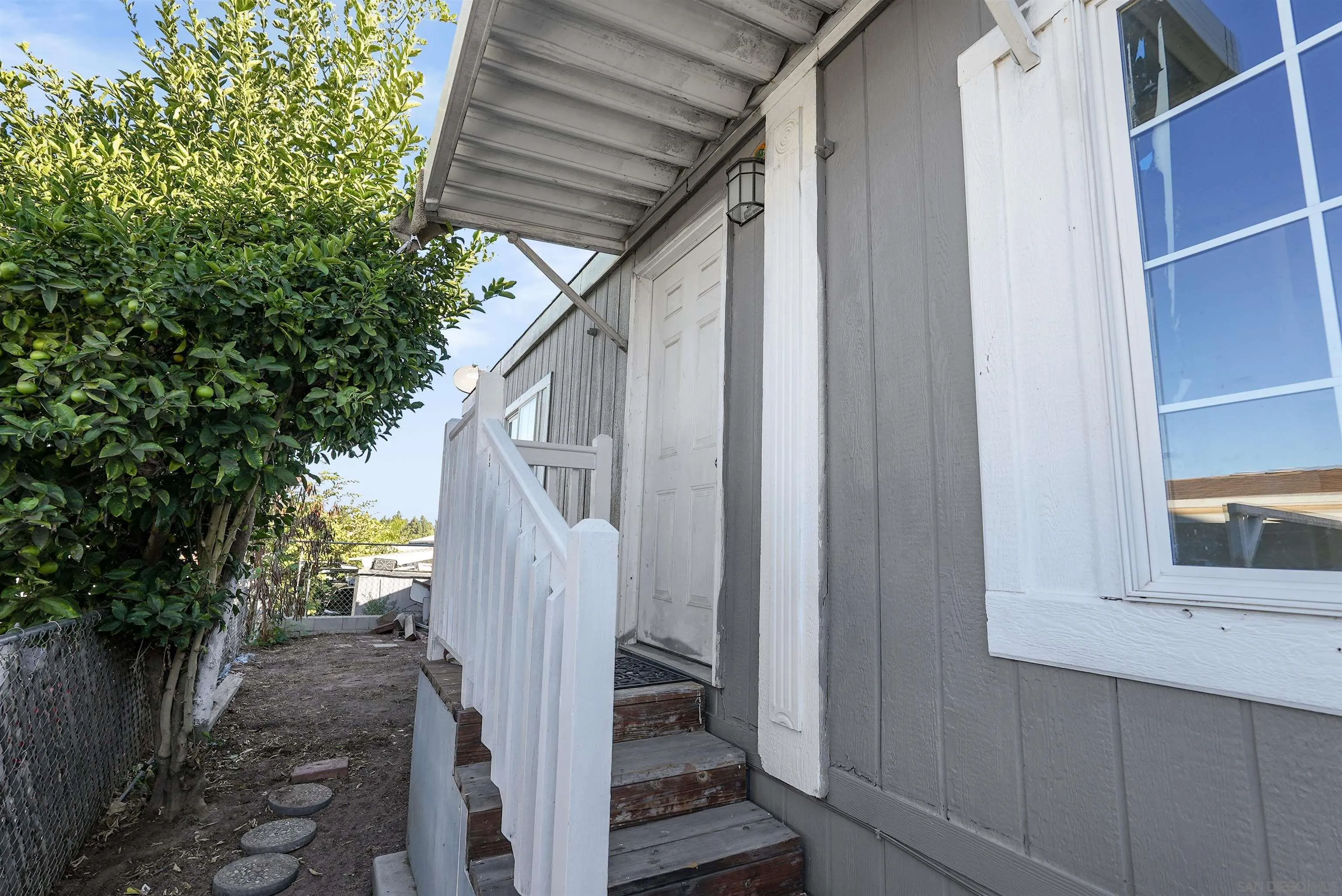 1455 Alturas Road, Unit SPC 18 Fallbrook, CA 92028 - Photo 29 of 50 a house view with a backyard