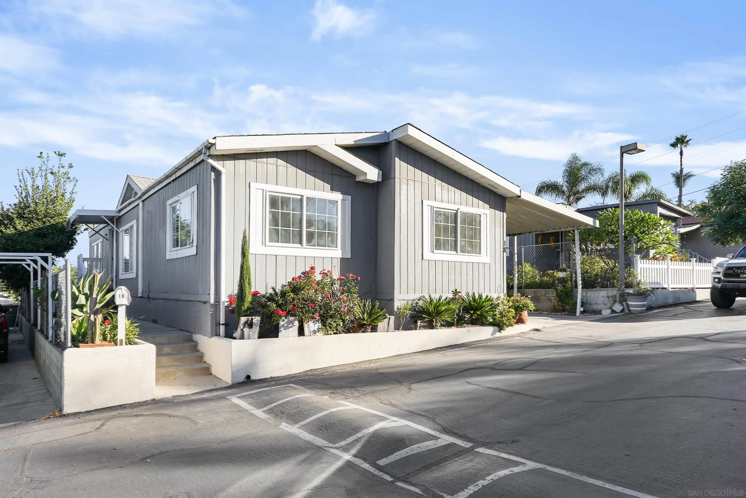 1455 Alturas Road, Unit SPC 18 Fallbrook, CA 92028 - Photo 34 of 50 a front view of a house with a yard