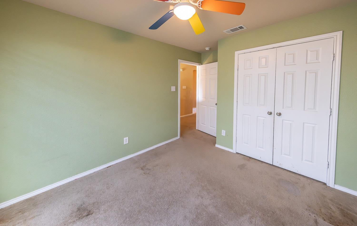 5211 Harvard Street Lubbock, TX 79416 - Photo 18 of 31 an empty room with a empty space and a window