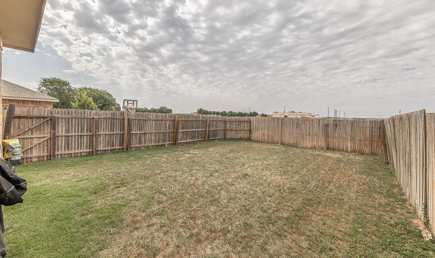 5211 Harvard Street Lubbock, TX 79416 - Photo 27 of 31 a view of a backyard