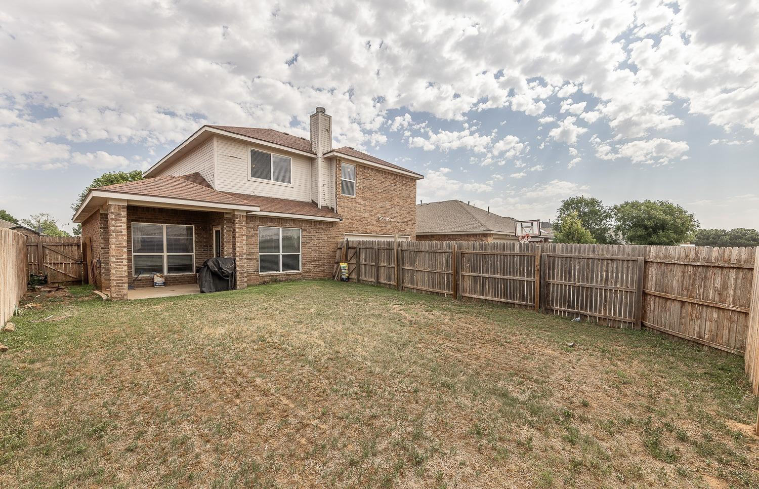 5211 Harvard Street Lubbock, TX 79416 - Photo 28 of 31 a view of a house with wooden fence