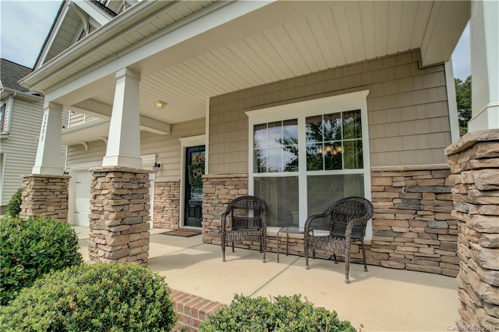 1200 Ridgehaven Road Waxhaw, NC 28173 - Photo 2 of 47 a front view of a house with outdoor seating