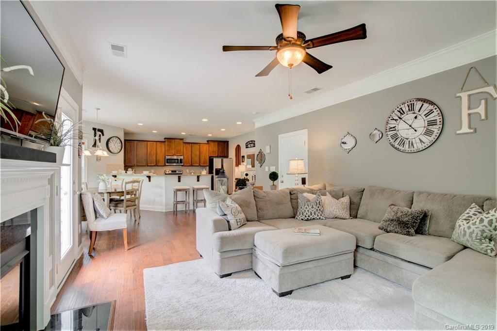 1200 Ridgehaven Road Waxhaw, NC 28173 - Photo 17 of 47 a living room with furniture and a fireplace