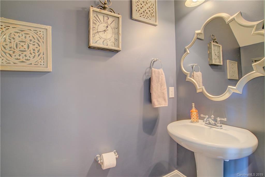1200 Ridgehaven Road Waxhaw, NC 28173 - Photo 21 of 47 a bathroom with a sink mirror and vanity
