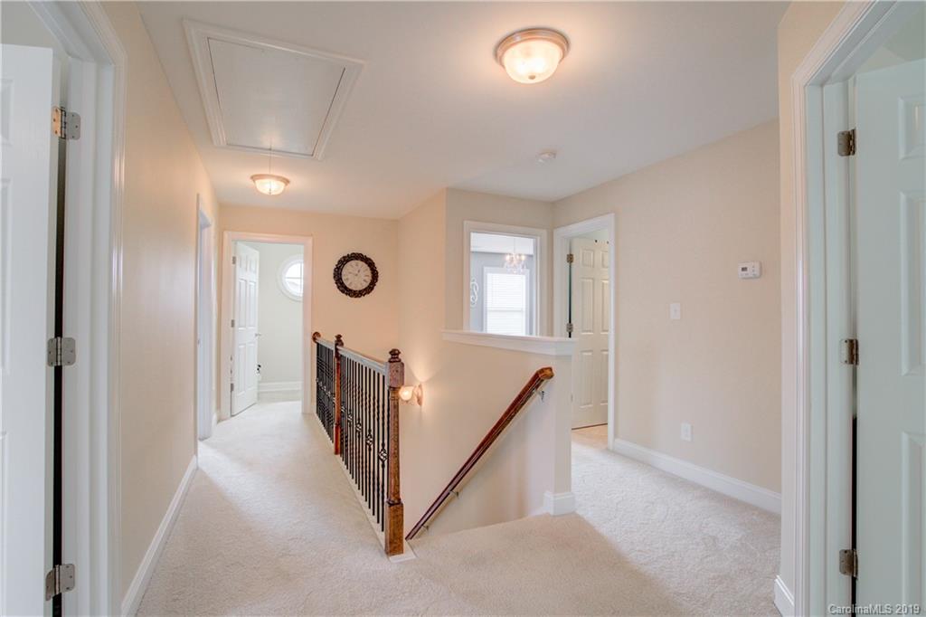 1200 Ridgehaven Road Waxhaw, NC 28173 - Photo 22 of 47 a view of a hallway with windows