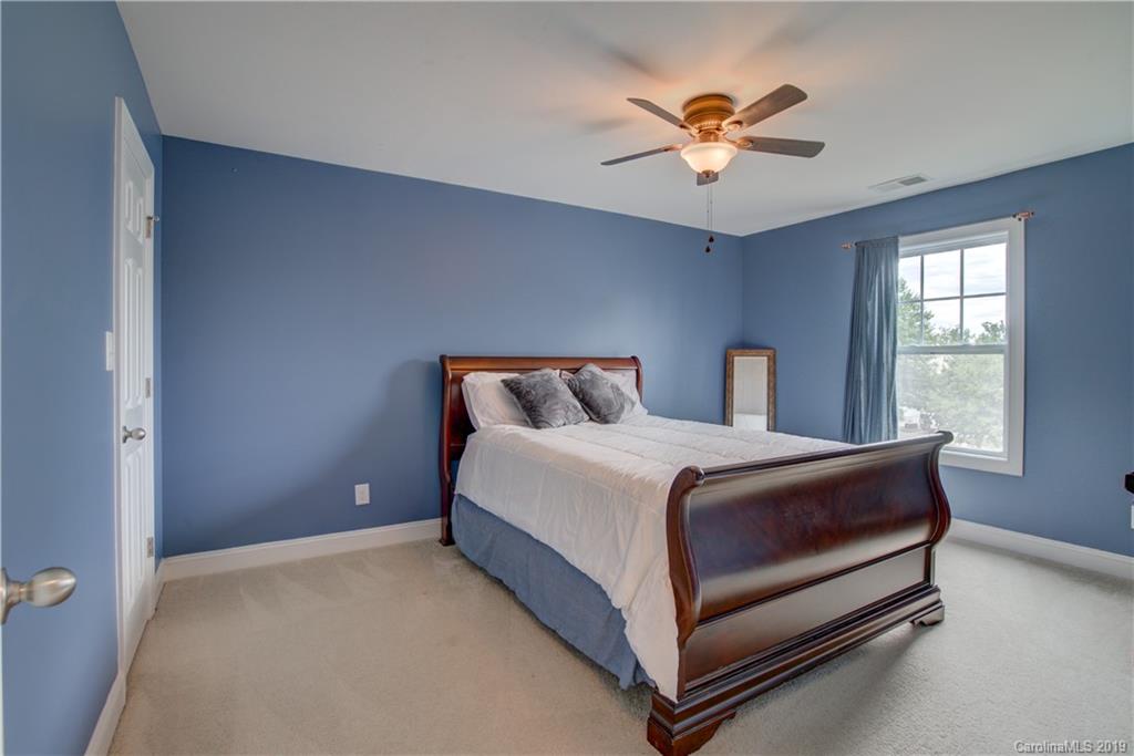 1200 Ridgehaven Road Waxhaw, NC 28173 - Photo 30 of 47 a bedroom with a bed and window