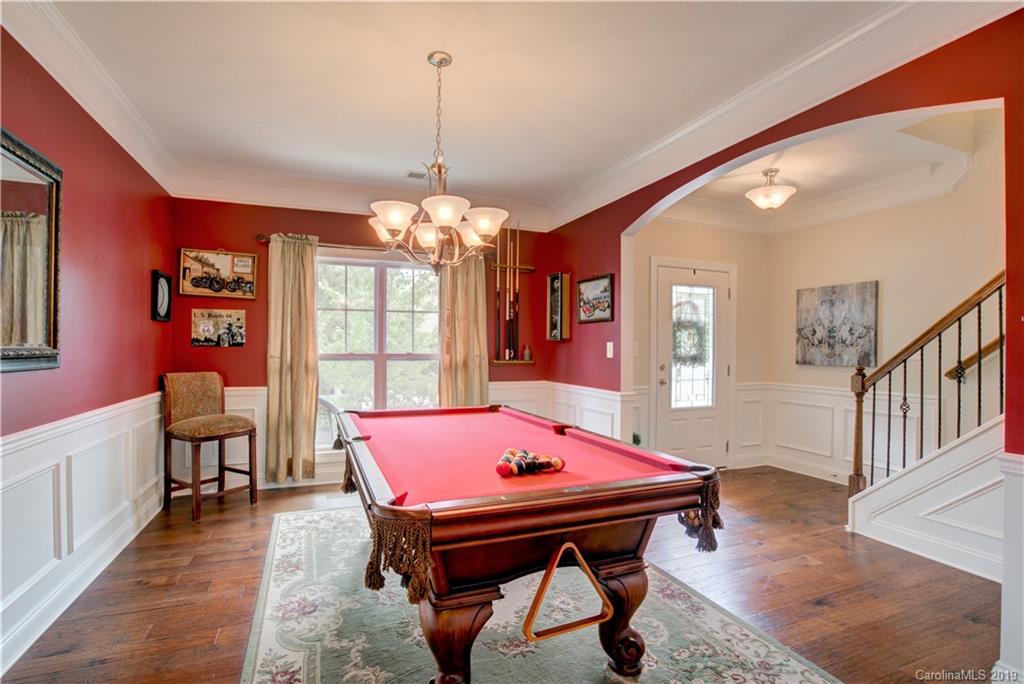 1200 Ridgehaven Road Waxhaw, NC 28173 - Photo 4 of 47 a room with pool table and windows