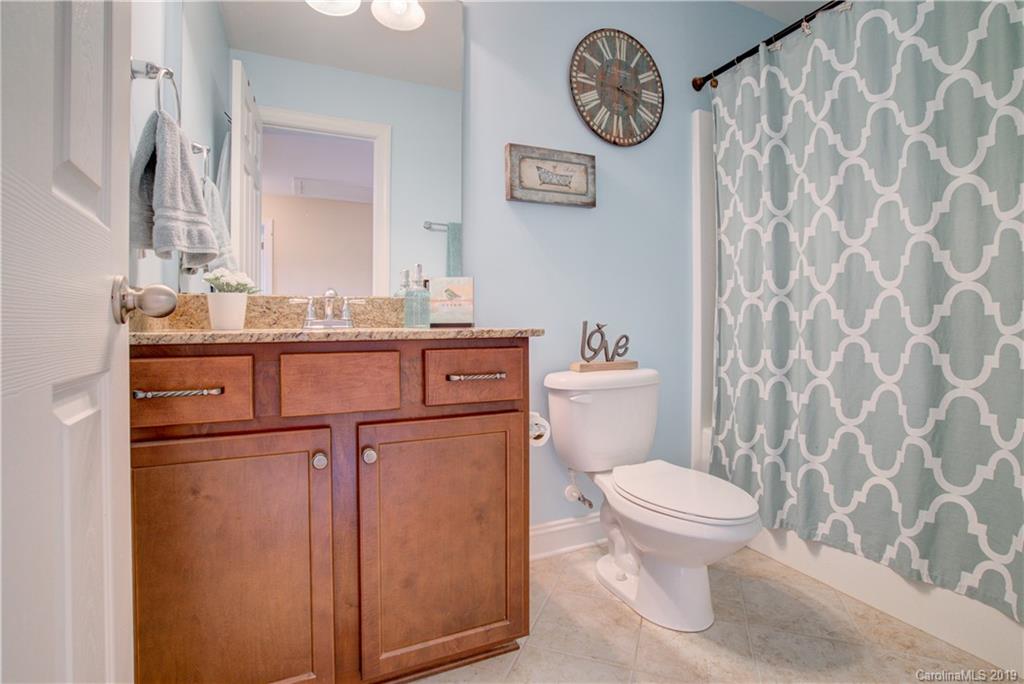 1200 Ridgehaven Road Waxhaw, NC 28173 - Photo 31 of 47 a bathroom with a toilet and a sink