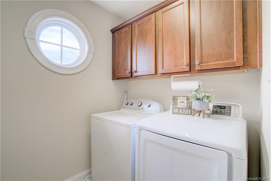 1200 Ridgehaven Road Waxhaw, NC 28173 - Photo 33 of 47 a utility room with dryer and washer