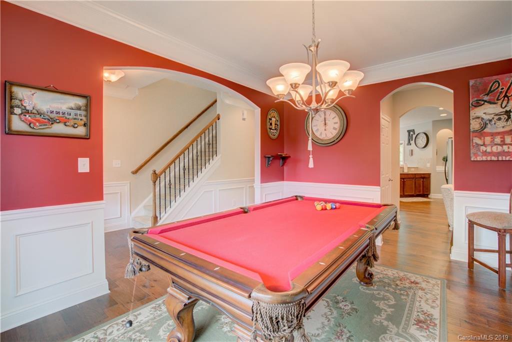 1200 Ridgehaven Road Waxhaw, NC 28173 - Photo 5 of 47 a room with pool table and wooden floor