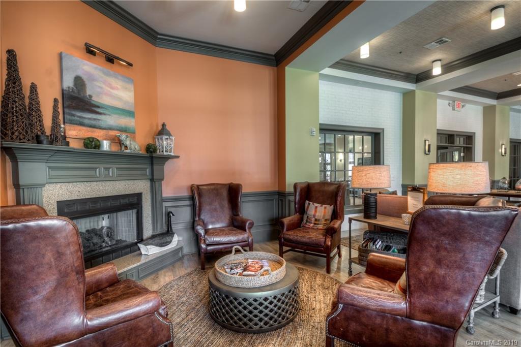 1200 Ridgehaven Road Waxhaw, NC 28173 - Photo 42 of 47 a living room with furniture and a fireplace