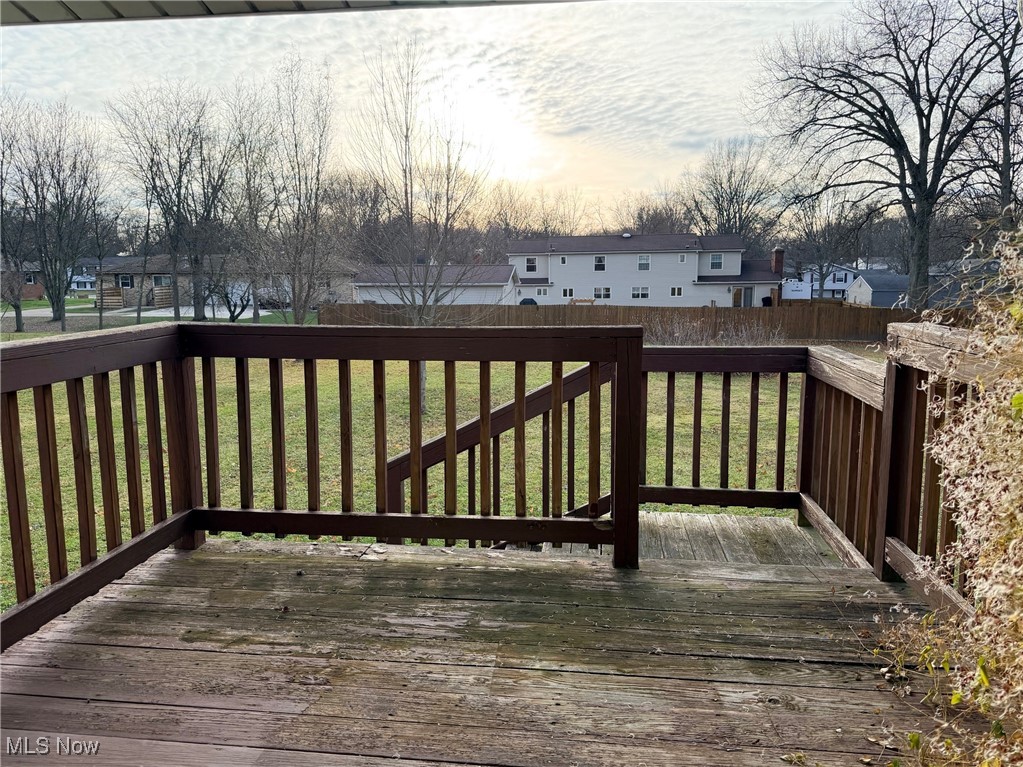 4556 Fishcreek Road Stow, OH 44224 - Photo 38 of 41 Wooden terrace featuring a residential view and a fenced backyard