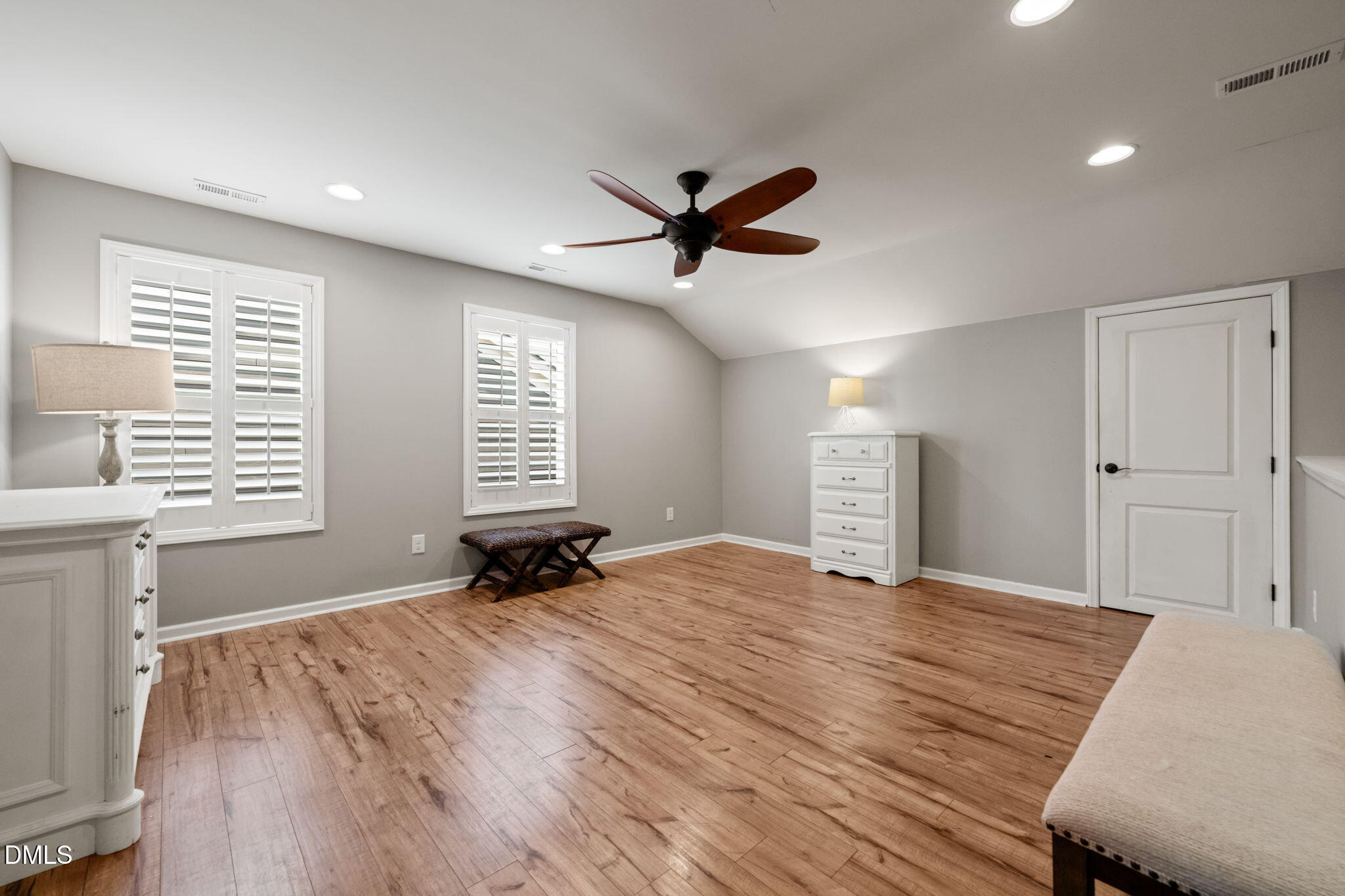 1716 Main Divide Drive Wake Forest, NC 27587 - Photo 33 of 45 a view of a livingroom with a window and a ceiling fan