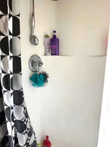 a close view of shoes stand and cabinets