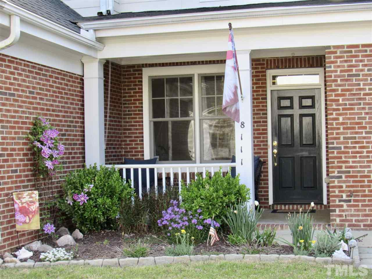 8111 Satillo Lane Raleigh, NC 27616 - Photo 2 of 27 Rocking Cahir front porch.