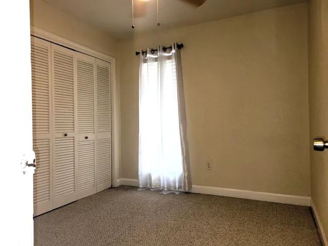 a view of empty room with a window